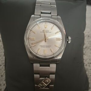Silver Rolex Oyster Perpetual Edition